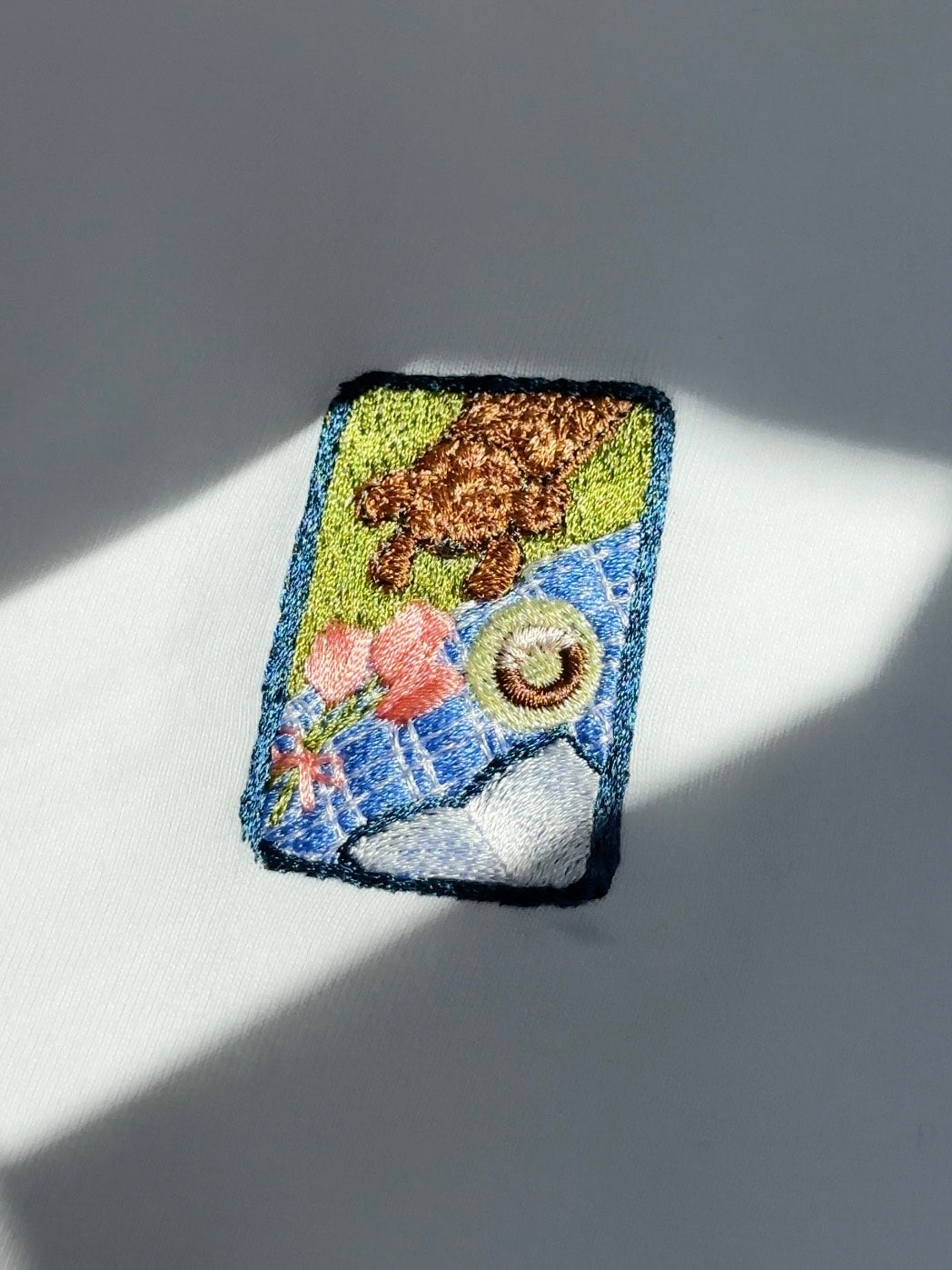 ドーナッツを狙うわんこ（スウェット）